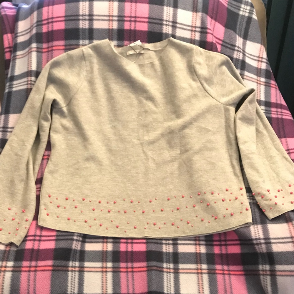 Grey Zara sweater with pink pearls.